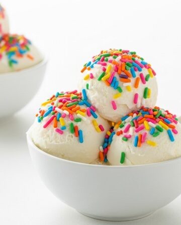 Snow Ice Cream Recipe with colorful sprinkles in white bowls